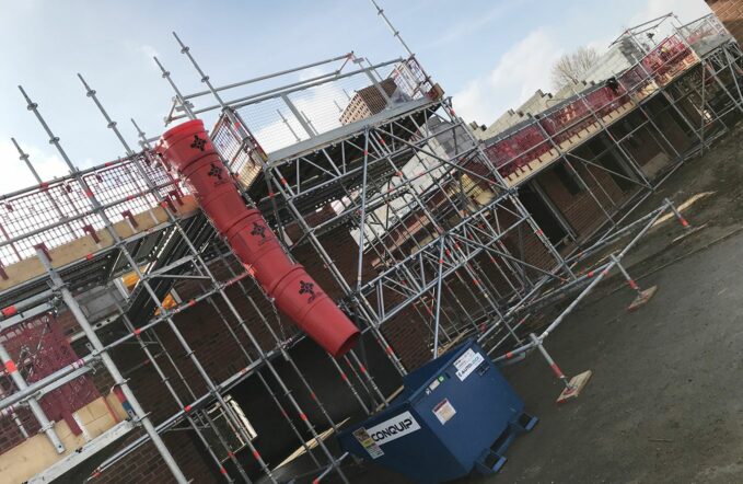 Scaffolding on new development with chained shoot